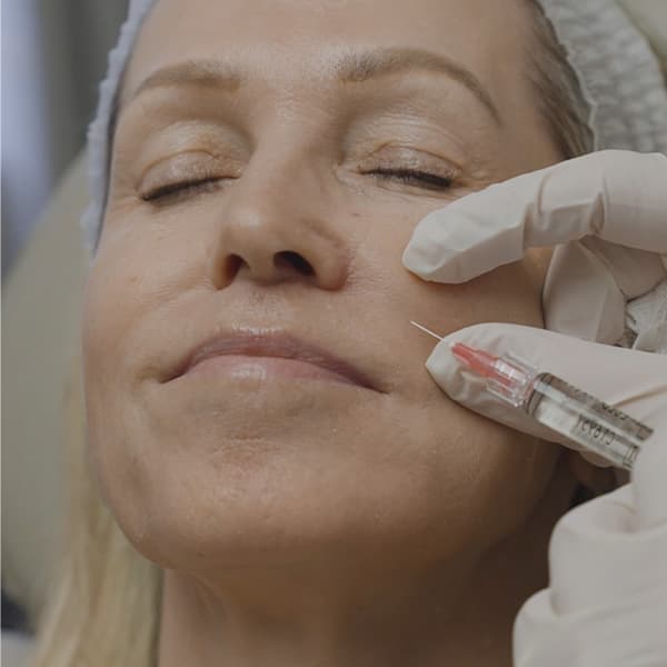 injection-face-needle-close-up